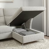 Canapea gri cu otoman de depozitare, pături în interior, țesătură texturată, picioare cromate.