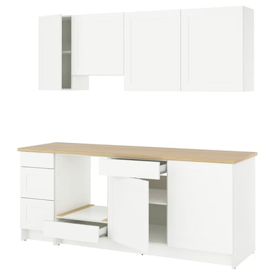 Dulapuri de bucătărie albe KNOXHULT. Sertarele și rafturile. Fabricat din melamină, laminat și margini din plastic. Design curat, modern.