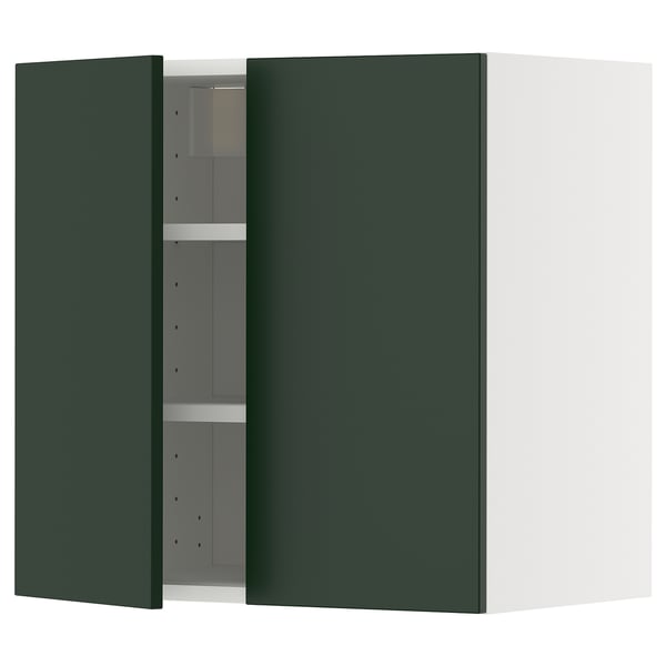 Dulap verde, deschis arătând rafturi. Design minimalist modern, balamale metalice.
