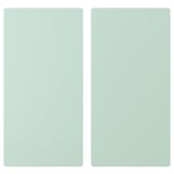 Două uși dreptunghiulare verde pastelat una lângă alta. Fiecare ușă este plată, cu margini rotunjite. Fabricat din plăci de fibre cu vopsea acrilică.