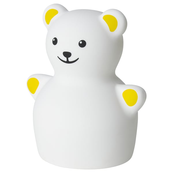 Lumină de noapte cu urs TÖVÄDER, albă cu accente galbene, strălucire blândă, design prietenos pentru copii.