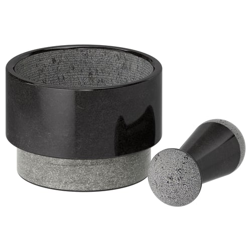 Black marble mortar and pestle set; smooth, round design.