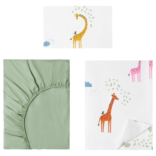 A childrens bedding set with a light green fitted sheet and bright white duvet cover featuring playful giraffe designs.