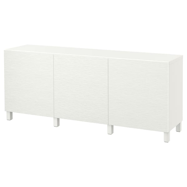 White BESTÅ storage unit. Rectangular, three-door sideboard with sleek design, white finish, and adjustable shelves.