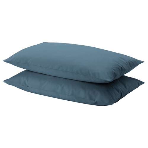 Stack of two DVALA blue cotton pillows, rectangular shape, plain design.
