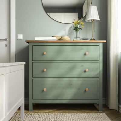 Green HEMNES chest with 3 drawers, wood top, brass handles, table lamp, mirror.