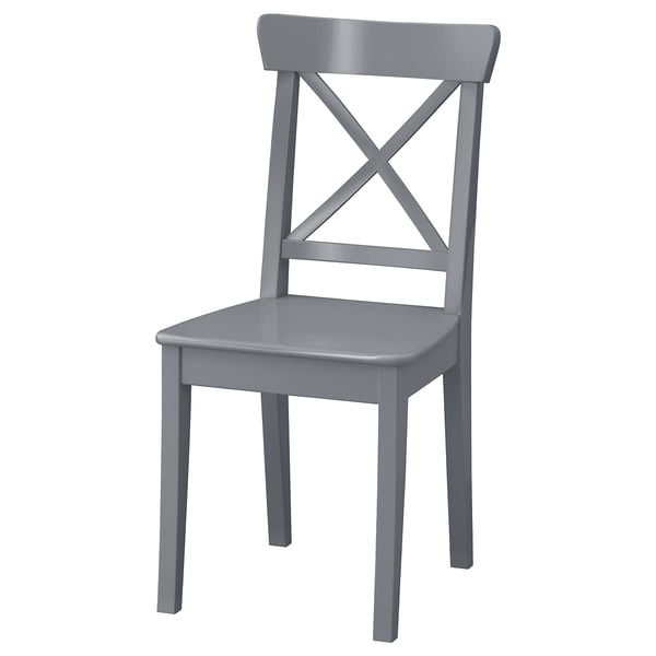 Modern, grey, wooden chair with x back design.