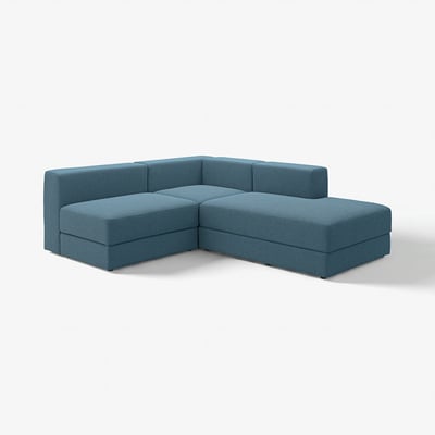 Blue l-shaped modular sofa with a soft, relaxed design and storage compartments, offering comfort and practicality.