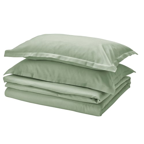 Light green LÄKEVÄNDEROT bedding set, folded neatly, featuring soft, textured lyocell material with sleek design.