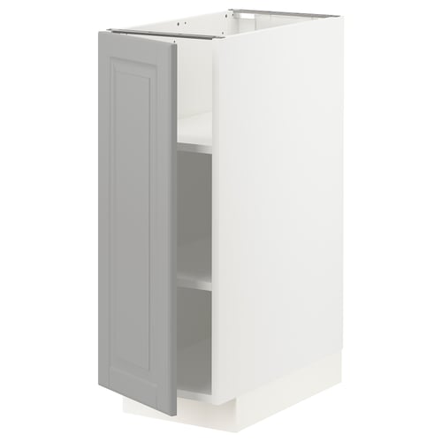 A white METOD kitchen cabinet with a grey bodbyn door, featuring a traditional design with bevelled edges.