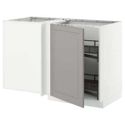 A modern kitchen unit, METOD brand, grey bodbyn doors with bevelled edges, white frame, open for access, corner base cabinet design.