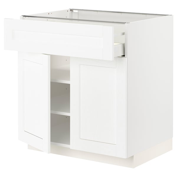 METOD white kitchen cabinet: sleek, square, foam, with adjustable shelves, smooth doors, & soft-closing drawers.