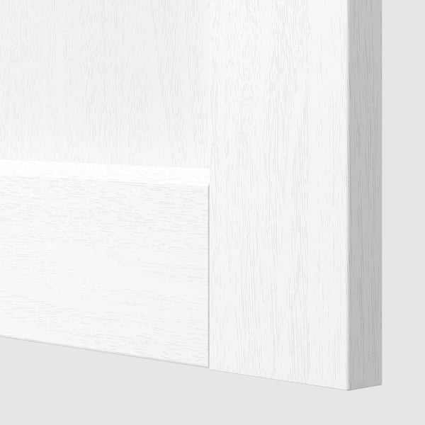 Close-up of smooth, white wooden panel with sleek finish, part of METOD kitchen system.