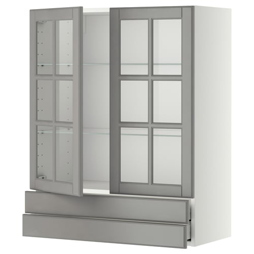 White and grey kitchen cabinet with glass doors.