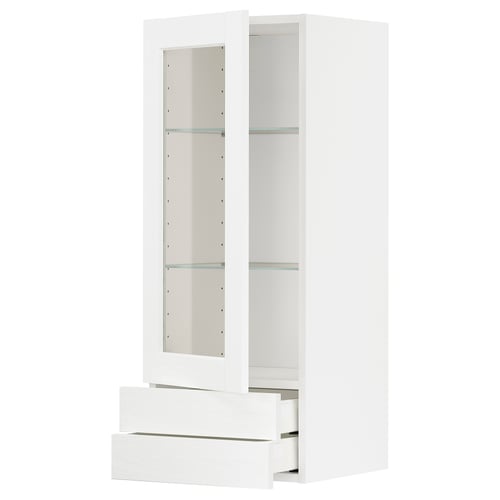 A white METOD kitchen cabinet with glass doors and drawers. It has a classic look with a sturdy frame and smooth-running drawers.