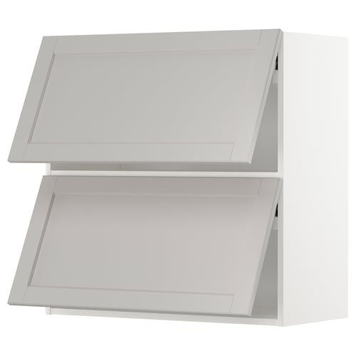 A light grey METOD kitchen cabinet with a traditional design. It two rectangular doors with bevelled edges and a sturdy frame.
