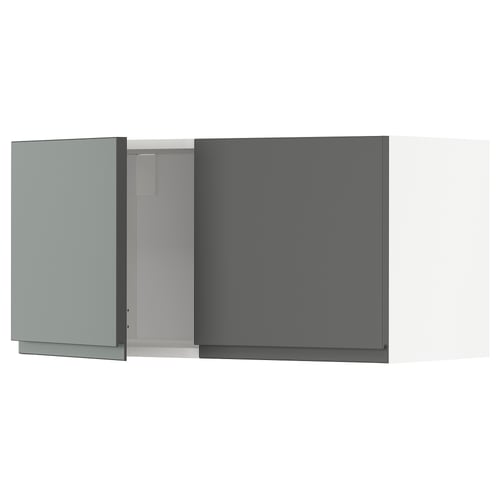Modular kitchen cabinet in matt dark grey with minimalist design and integrated handles.