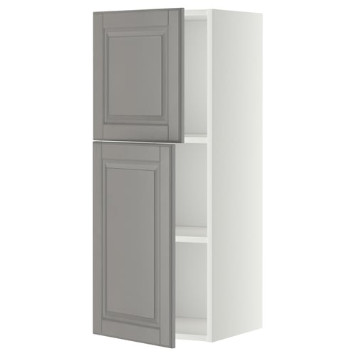 METOD kitchen unit in soft grey with bevelled edges. Wall-mounted, two-door cabinet with adjustable shelf.