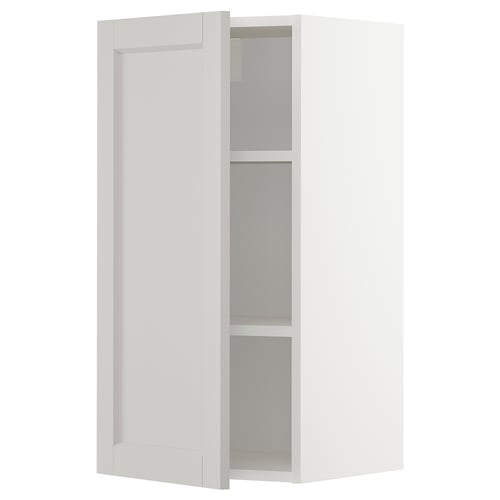 A METOD wall cabinet in white with two adjustable shelves and bevelled edges.
