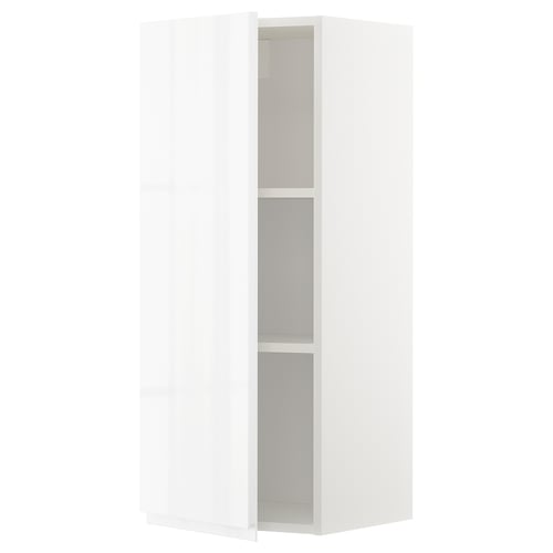 A white high-gloss METOD kitchen cabinet with two adjustable shelves. The sleek, modern design handle-less doors.