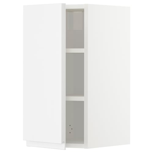 A high gloss white METOD kitchen cabinet with integrated shelves and handles. It modern design with sleek lines and adjustable shelving.