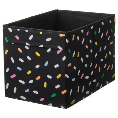 A black SKÅJARE storage box with colourful, irregular shapes. Square, made of recycled polyester.