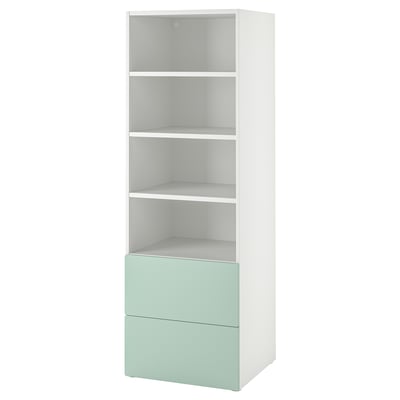 A white and mint green SMÅSTAD bookcase with shelves and drawers for storage.