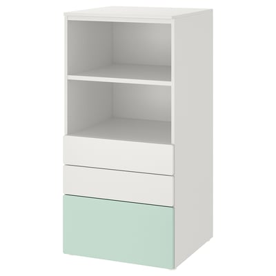 A white and light green SMÅSTAD bookcase with three sections: two open shelves at the top and three drawers at the bottom.