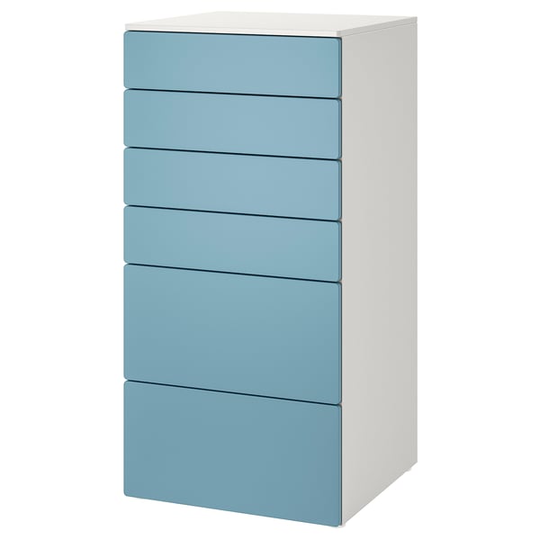 A tall, white SMÅSTAD chest with six blue drawers. It has a modern, minimalist design, ideal for storing baby or childrens clothes.