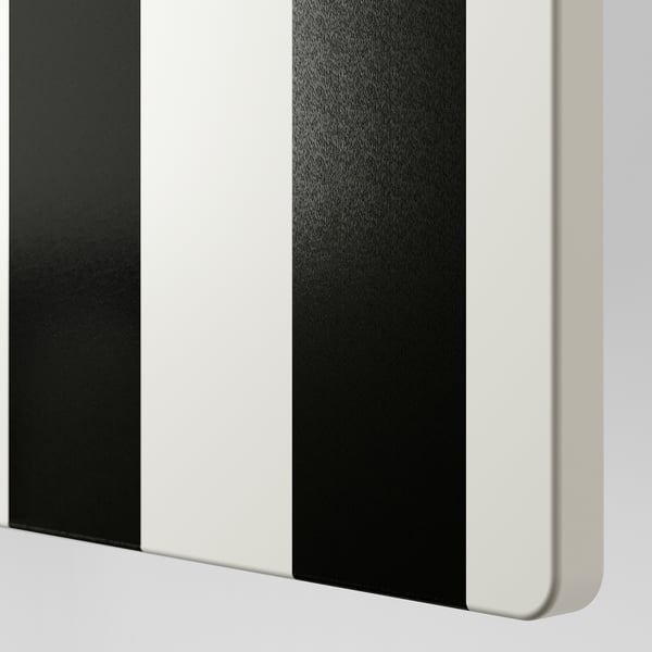 Modern wardrobe with sleek black and white stripes, smooth finish, and sturdy design.
