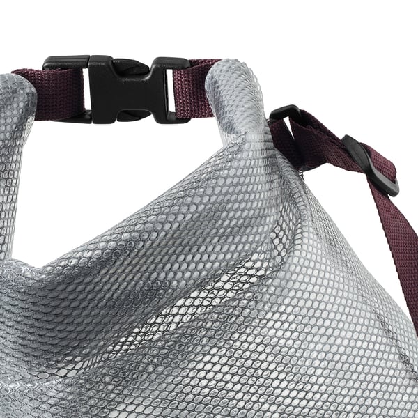 Close-up of durable, waterproof bag straps & buckles. Textured material ensures secure, comfortable carry.