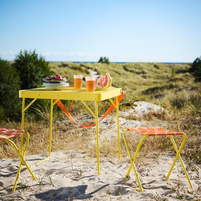 STRANDÖN Folding table, bright yellow, 70x55 cm