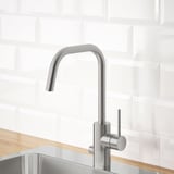 A modern, stainless steel kitchen faucet with a high arc spout, designed for water and energy efficiency.