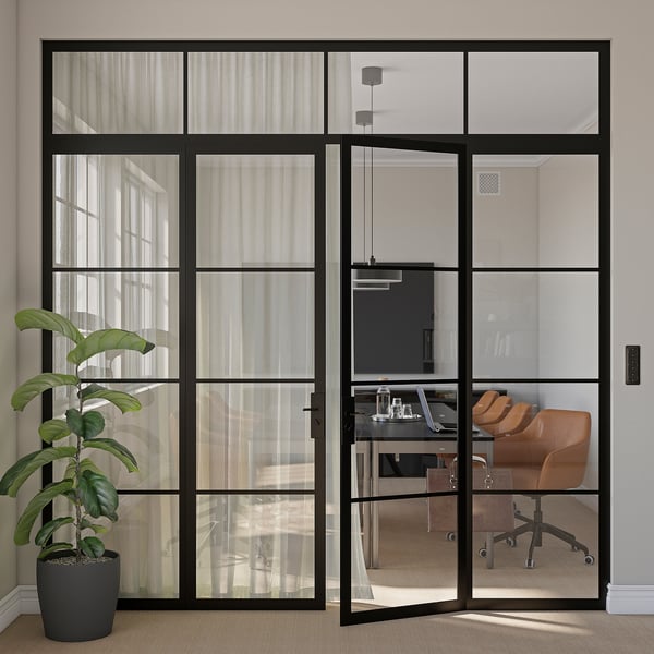 Modern office with glass doors, sheer curtains, leather chairs, plant.
