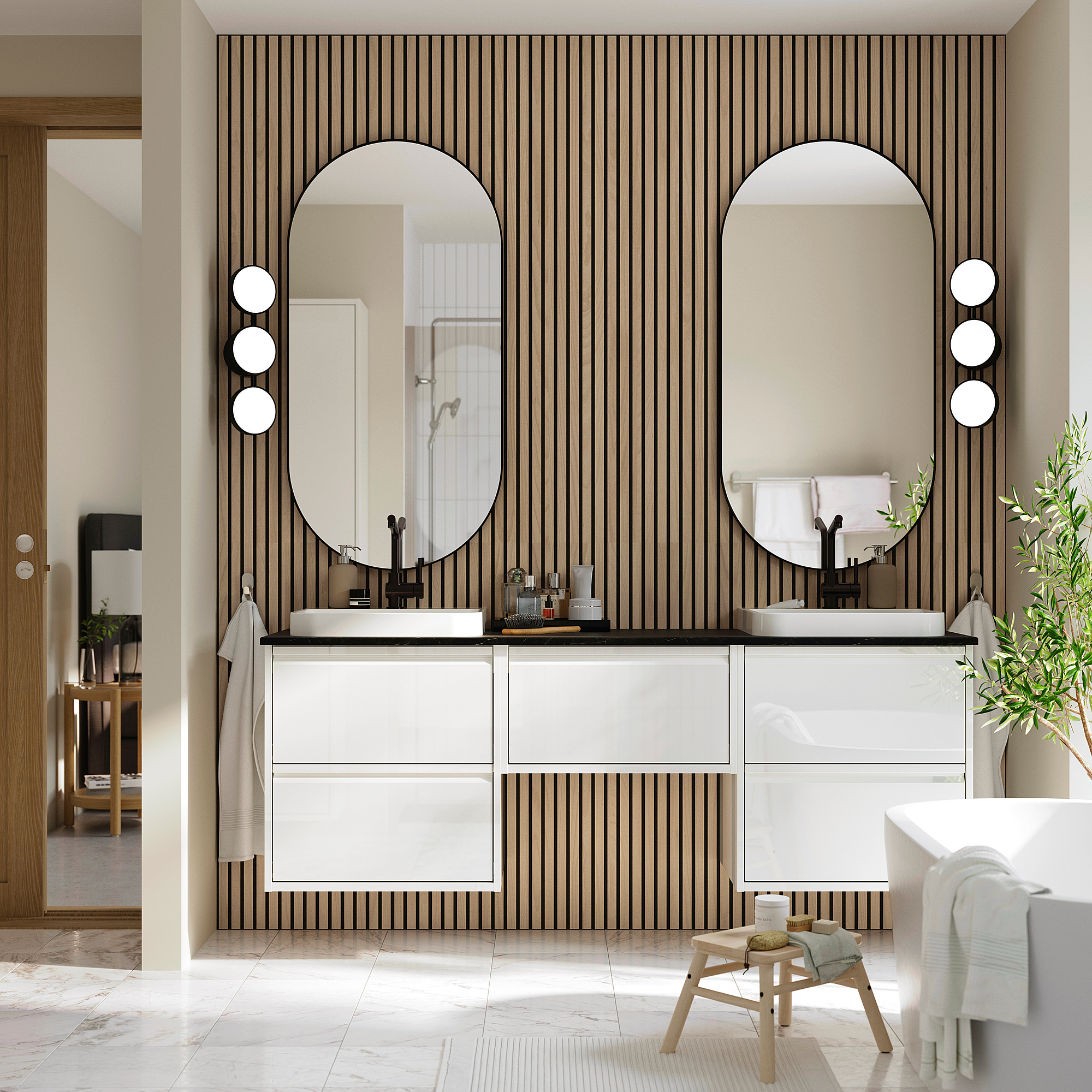 Modern bathroom with white vanity, black mirrors, marble dual sinks, striped wall, stool, plant.