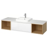 A modern white bathroom vanity with open wooden shelves on both sides and a marble countertop, housing a square ceramic sink with a chrome faucet.