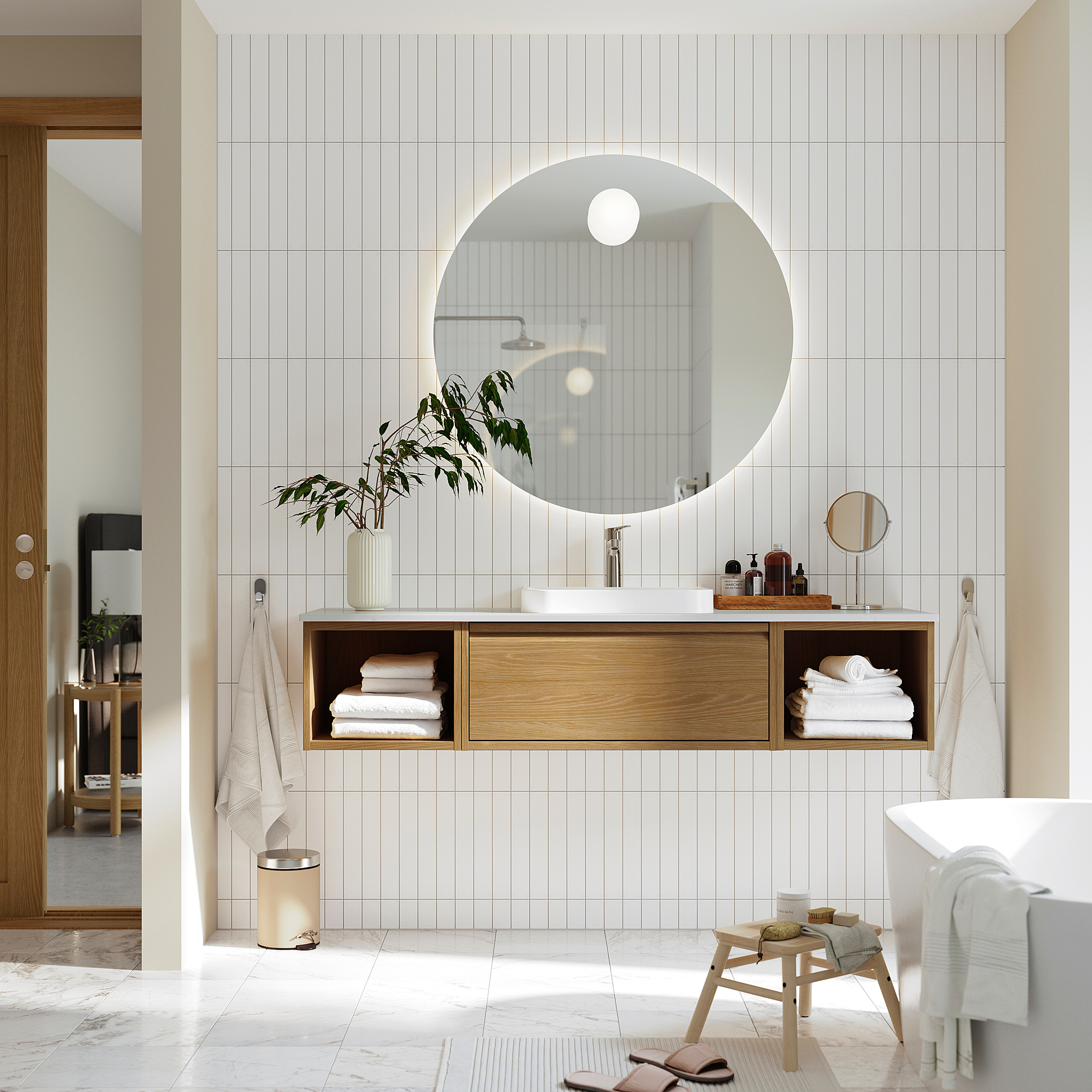 ÄNGSJÖN light oak bathroom vanity with mirror and storage.