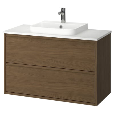 A modern walnut-colored bathroom cabinet with a white quartz countertop and sink. It sleek drawer handles and a minimalist, wall-mounted design.
