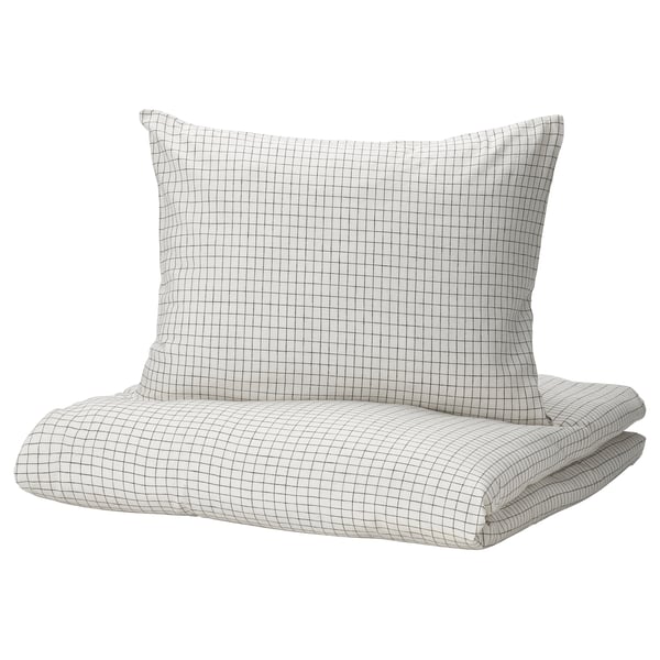ÅKERFIBBLA duvet set, checkered white/black. Soft cotton/linen, pre-washed, with button closure. Rectangle shape, clean design.