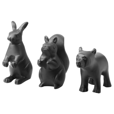 Three black animal statues: rabbit, hippo, bear, for home decor. Details in materials and playful shapes.