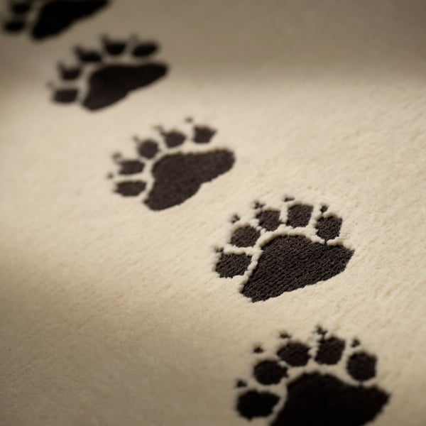 ALPTALL Rug, beige/paw print pattern, 90x130 cm