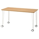 Anfalle light wooden desk with white legs and wheels.