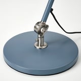 A sleek, modern lamp with a blue base and arm, featuring adjustable metal joints for directional light.