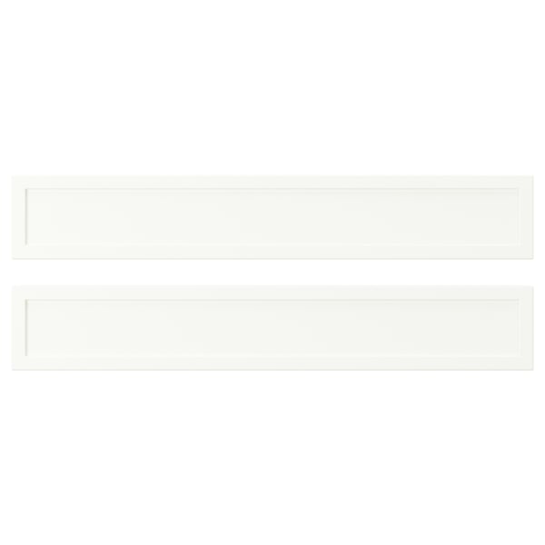 Two white rectangular shelves with plastic edging and foil.