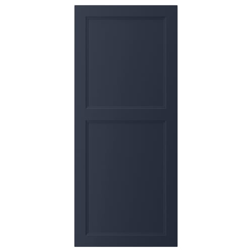 A blue AXSTAD kitchen cabinet door, featuring a smooth, indented panel design with a modern, sleek appearance.