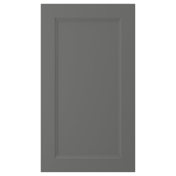 A dark grey AXSTAD cabinet door with a smooth, rectangular shape and inset panel design.