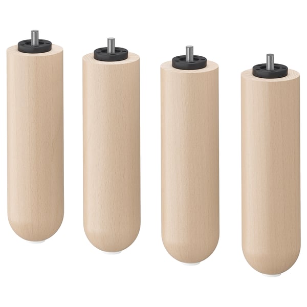 Four light-colored wooden legs with black screws and plastic inserts.
