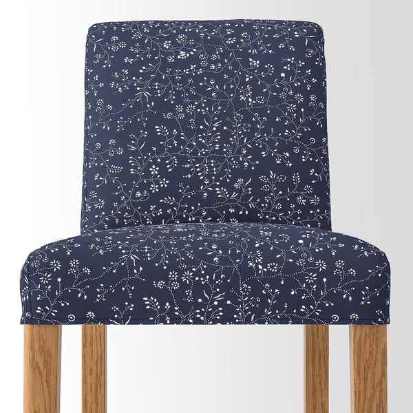 Dark blue floral barstool with wooden legs, high-quality cushion.