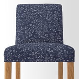 Dark blue floral barstool with wooden legs, high-quality cushion.