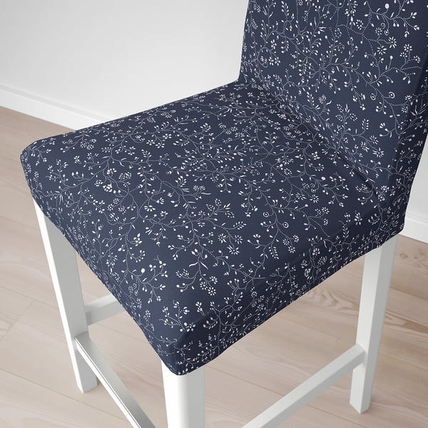 Modern bar stool with dark gray floral cover, white frame. Comfortable, stylish, and removable for easy washing.